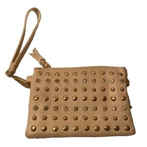 Charming Charlie wristlet cream with crystals and studs